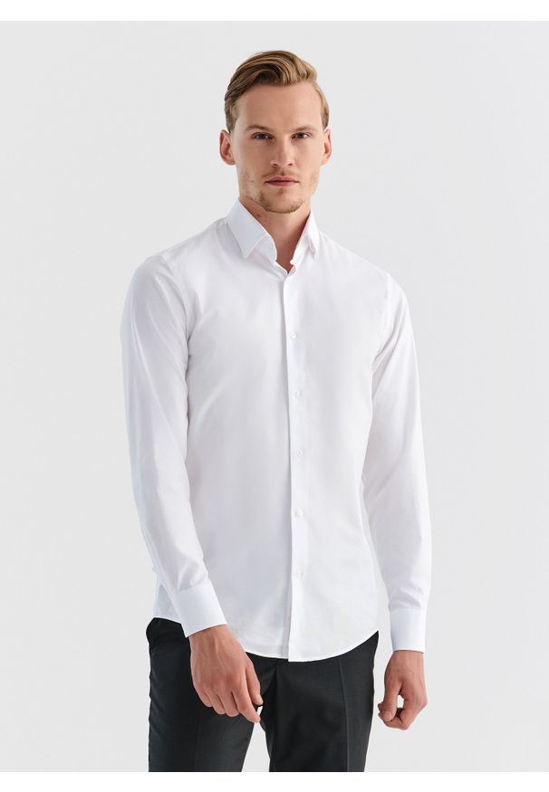 Pako Lorente - PAKO LORENTE – Koszula męska w kolorze białym P000B-1X-051-B-S. Typ kołnierza: kołnierzyk włoski. Kolor: biały. Materiał: bawełna. Długość rękawa: długi rękaw. Długość: długie. Wzór: gładki. Styl: elegancki