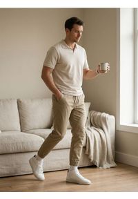 Sinsay - Bawełniana koszulka polo - kremowy. Typ kołnierza: polo. Kolor: kremowy. Materiał: bawełna #1