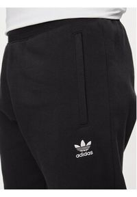 Adidas - adidas Spodnie dresowe Trefoil Essentials IR7798 Czarny Slim Fit. Kolor: czarny. Materiał: bawełna #5
