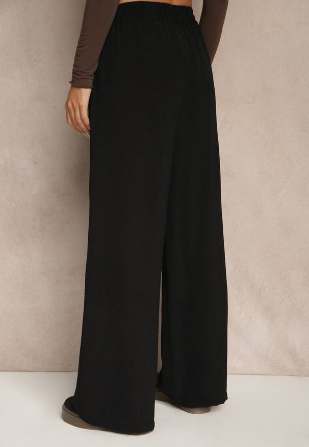 Renee - Czarne Szerokie Spodnie z Wiskozą z Gumką w Pasie Lealirre. Okazja: na co dzień. Kolor: czarny. Materiał: wiskoza. Wzór: gładki. Styl: casual