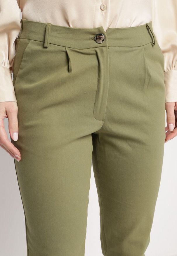 Born2be - Zielone Spodnie z Regularną Talią i Gumką w Pasie Suirelle. Kolor: zielony. Styl: elegancki