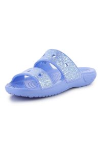 Klapki Crocs Classic Glitter Sandal Jr 207788-5Q6 niebieskie. Okazja: na plażę, na co dzień. Kolor: niebieski. Materiał: materiał. Sezon: lato