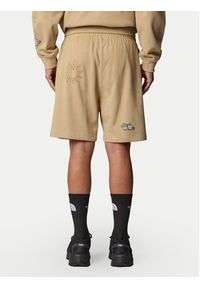 The North Face Szorty sportowe Unisex Mountain Cleanup NF0A8C2X Beżowy Relaxed Fit. Kolor: beżowy. Materiał: bawełna