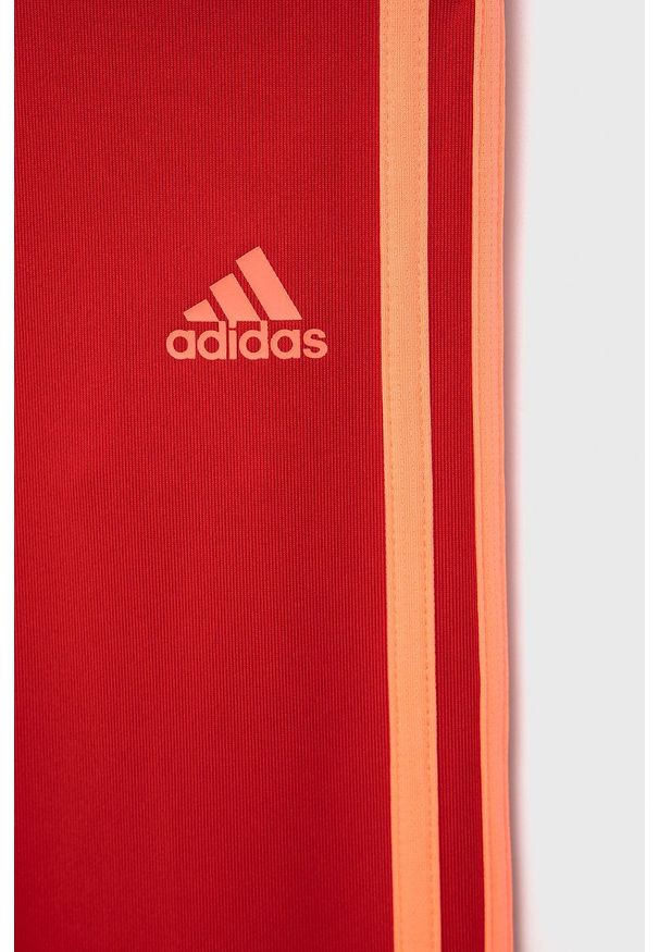 adidas Performance Legginsy dziecięce kolor czerwony z aplikacją. Kolor: czerwony. Materiał: dzianina. Wzór: aplikacja