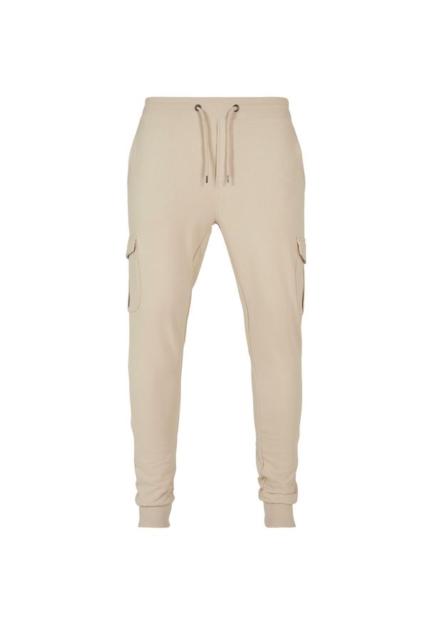 Spodnie dresowe Urban Classics Fitted Cargo GT. Kolor: beżowy. Materiał: dresówka