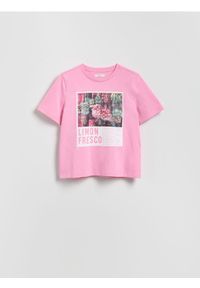 Reserved - T-shirt z nadrukiem - jasnopomarańczowy. Kolor: pomarańczowy. Materiał: bawełna, dzianina. Wzór: nadruk