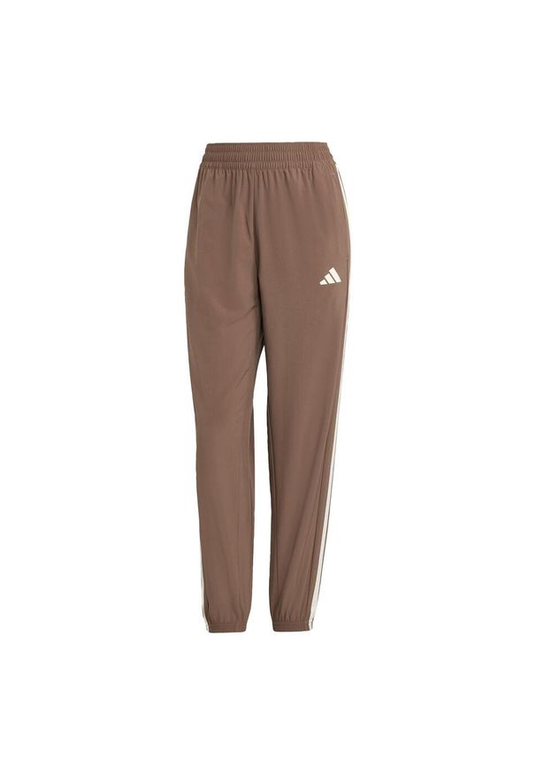Adidas - Spodnie Train Essentials 3-Stripes Woven. Kolor: biały, wielokolorowy, beżowy, brązowy. Materiał: materiał. Technologia: ClimaCool (Adidas)