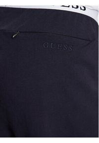 Guess Spodnie piżamowe U3YB00 KBS91 Granatowy Regular Fit. Kolor: niebieski. Materiał: bawełna