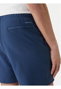 Calvin Klein Jeans Szorty sportowe Collegiate LV04RF275G Granatowy Regular Fit. Kolor: niebieski. Materiał: bawełna. Styl: sportowy #5