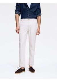 Reserved - Spodnie chino slim fit - beżowy. Kolor: beżowy. Materiał: tkanina, bawełna