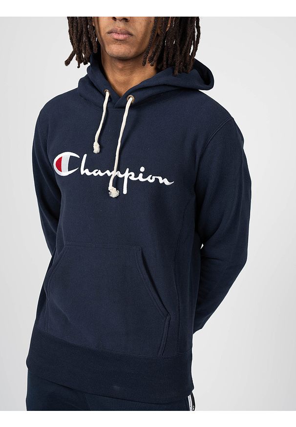 Champion Bluza | 212574 | Mężczyzna | Granatowy. Okazja: na co dzień. Typ kołnierza: kaptur. Kolor: niebieski. Materiał: bawełna. Wzór: aplikacja. Styl: casual