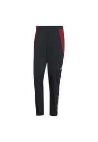 Adidas - Spodnie prezentacyjne Manchester United 2024/25. Kolor: czarny. Sport: piłka nożna #1