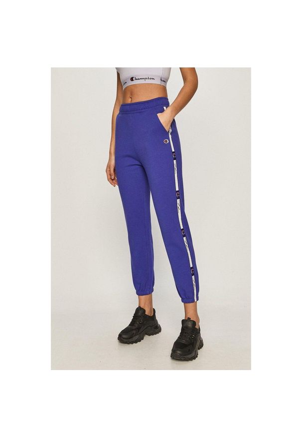 Damskie spodnie dresowe Champion Track Pant fioletowe XS. Kolor: fioletowy. Materiał: dresówka. Długość: długie