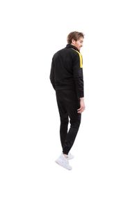 Givova - Dres Męski Tuta Revolution. Kolor: żółty, wielokolorowy, czarny. Materiał: dresówka