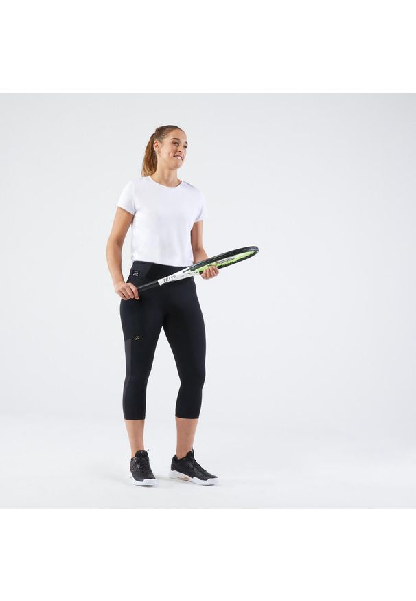 ARTENGO - Krótkie legginsy do tenisa damskie Artengo Dry Hip Ball. Kolor: czarny. Materiał: poliester, elastan, poliamid, materiał. Długość: krótkie. Sport: tenis