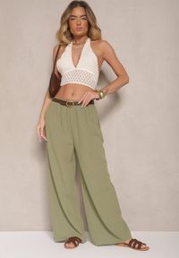 Renee - Ciemnozielone Spodnie Palazzo o Szerokim Kroju High Waist Ollevia. Okazja: na co dzień, na spotkanie biznesowe. Stan: podwyższony. Kolor: zielony. Materiał: jedwab. Wzór: aplikacja. Styl: biznesowy, elegancki, casual #1