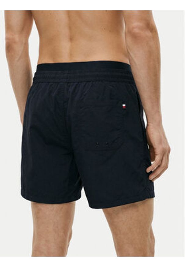 TOMMY HILFIGER - Tommy Hilfiger Szorty kąpielowe UM0UM03749 Granatowy Regular Fit. Kolor: niebieski. Materiał: syntetyk