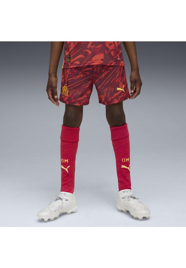 Puma - Młodzieżowe szorty bramkarskie Olympique Marsylia 25/26 PUMA. Kolor: czerwony, pomarańczowy, wielokolorowy, żółty. Materiał: tkanina. Sport: piłka nożna