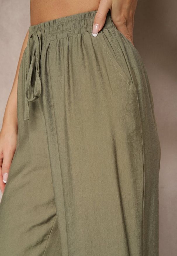 Renee - Zielone Spodnie o Szerokim Kroju High Waist z Wiązaniem Fenalin. Okazja: na co dzień, na imprezę, na spacer. Stan: podwyższony. Kolor: zielony. Styl: elegancki, casual