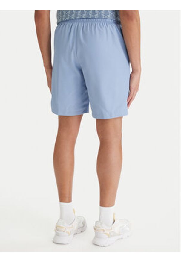 Lacoste Szorty sportowe GH353T Błękitny Relaxed Fit. Kolor: niebieski. Materiał: syntetyk. Styl: sportowy