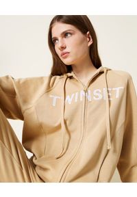 TwinSet - Beżowa bluza z wyhaftowanym logo Twinset. Typ kołnierza: kaptur. Kolor: beżowy. Materiał: elastan, poliester, bawełna
