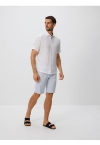 Reserved - Szorty chino regular - jasnoniebieski. Kolor: niebieski. Materiał: bawełna, tkanina