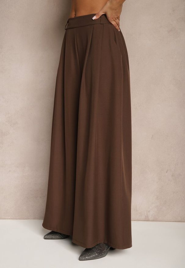 Renee - Brązowe Eleganckie Spodnie Palazzo z Szerokimi Nogawkami Adivisa. Stan: podwyższony. Kolor: brązowy. Styl: elegancki