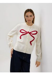Reserved - Kardigan z kokardką - kremowy. Typ kołnierza: kokarda. Kolor: kremowy. Materiał: dzianina #1