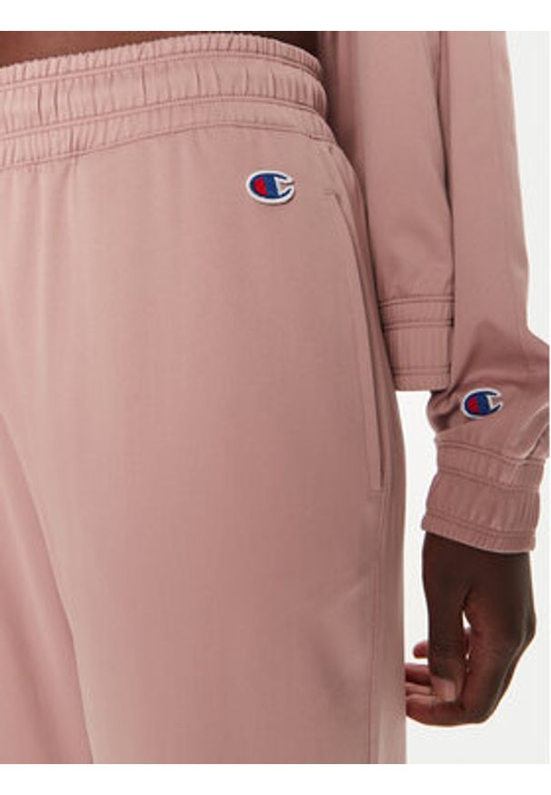 Champion Spodnie dresowe 116260 Różowy Regular Fit. Kolor: różowy. Materiał: syntetyk