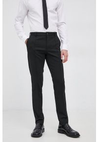 Calvin Klein Spodnie męskie kolor czarny dopasowane. Kolor: czarny. Materiał: włókno, tkanina. Wzór: gładki