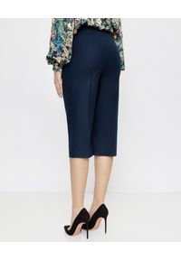ICON - Granatowe spodnie Culotte z wełny. Stan: podwyższony. Kolor: niebieski. Materiał: wełna. Styl: elegancki