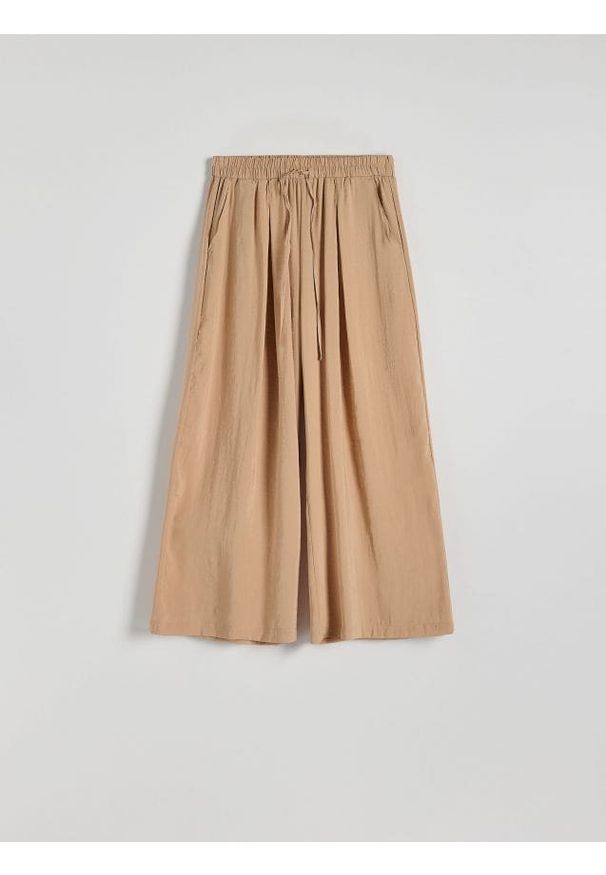 Reserved - Spodnie culotte z modalu - brzoskwiniowy. Kolor: pomarańczowy