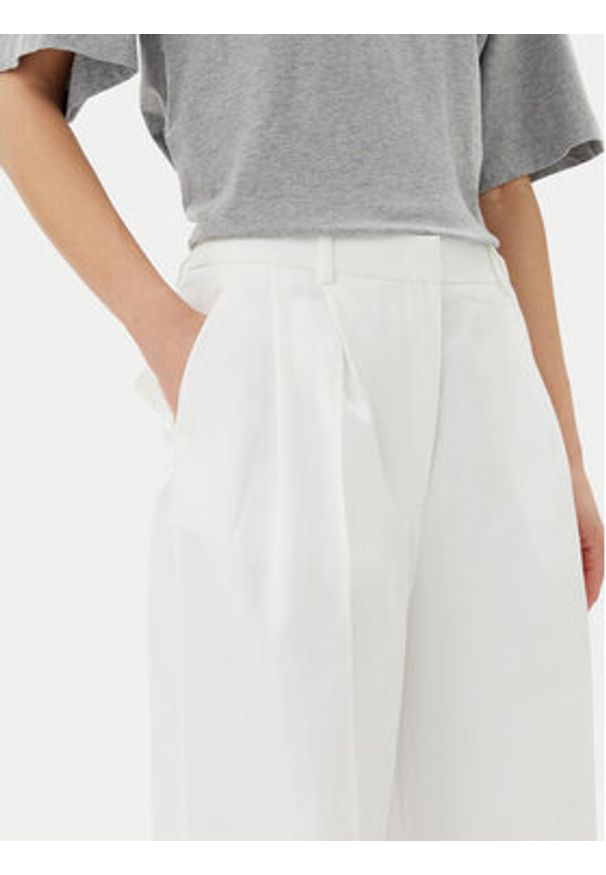 TOMMY HILFIGER - Tommy Hilfiger Spodnie materiałowe WW0WW47214 Biały Regular Fit. Kolor: biały. Materiał: syntetyk