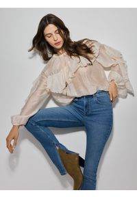 Reserved - Jeansy slim fit z rozcięciem - niebieski. Kolor: niebieski