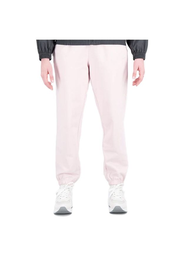 Spodnie New Balance WP31503SOI - różowe. Kolor: różowy. Materiał: bawełna, dresówka