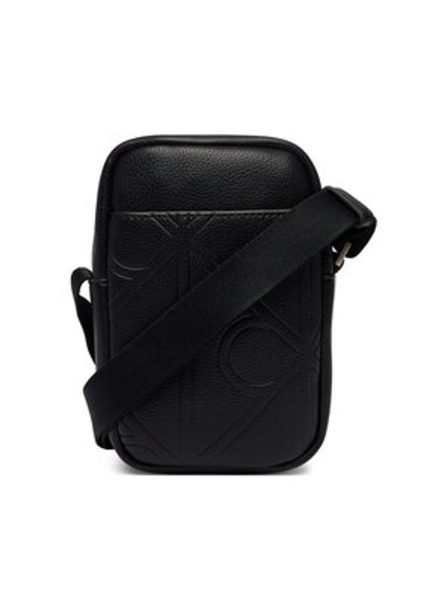 Calvin Klein Saszetka Emblem Aop Emboss Slim Reporter LV04D3371G Czarny. Kolor: czarny. Materiał: skóra