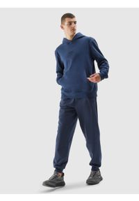4f - Spodnie dresowe joggery męskie - granatowe. Kolor: niebieski. Materiał: dresówka