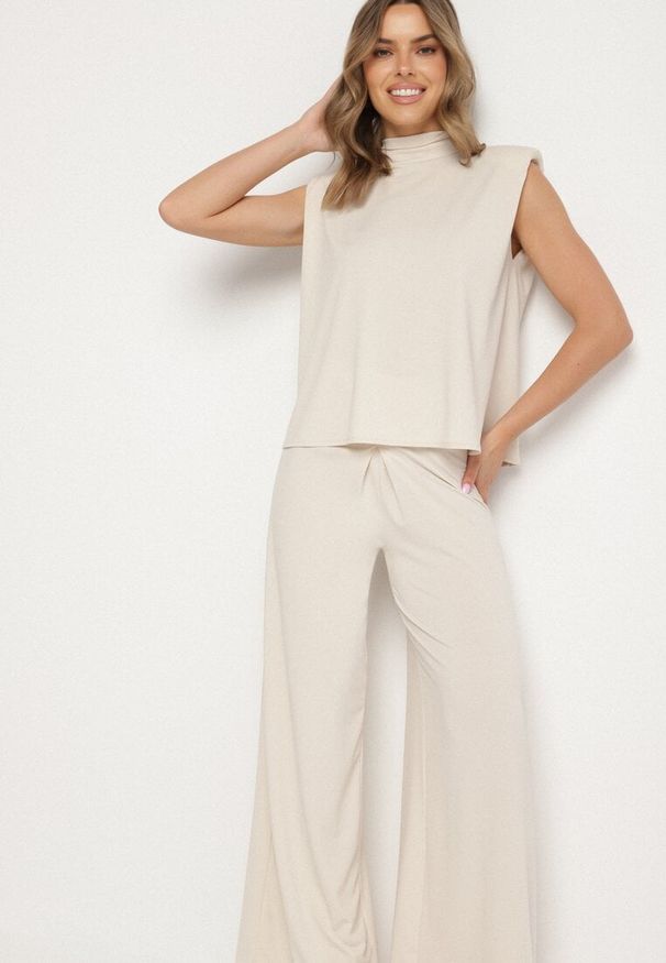 Born2be - Beżowy Komplet Bluzka z Wiązaniem i Szerokie Spodnie Halazea. Kolor: beżowy