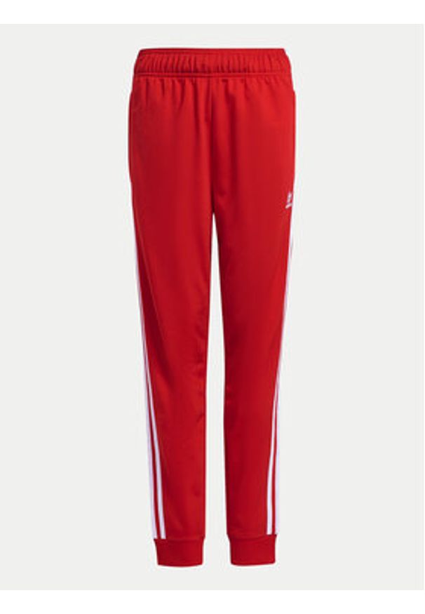 Adidas - adidas Spodnie dresowe adicolor SST IX7631 Czerwony Regular Fit. Kolor: czerwony. Materiał: syntetyk