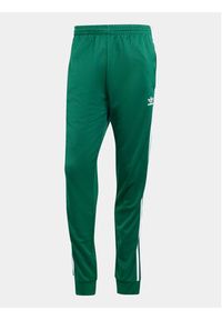 Adidas - adidas Spodnie dresowe adicolor Classics SST IR9886 Zielony Slim Fit. Kolor: zielony. Materiał: bawełna, syntetyk #4
