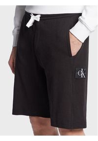 Calvin Klein Jeans Szorty sportowe J30J322914 Czarny Regular Fit. Kolor: czarny. Materiał: bawełna. Styl: sportowy