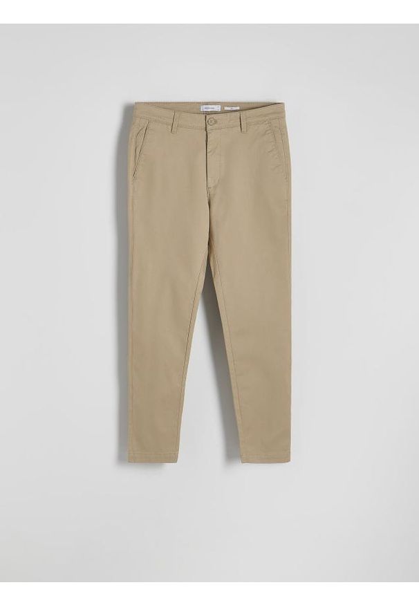 Reserved - Spodnie chino slim fit - beżowy. Kolor: beżowy. Materiał: tkanina, bawełna