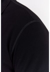 Dolce and Gabbana - DOLCE & GABBANA Czarna koszulka polo z aplikacją z logo. Typ kołnierza: polo. Kolor: czarny. Materiał: prążkowany. Długość rękawa: krótki rękaw. Wzór: aplikacja #5