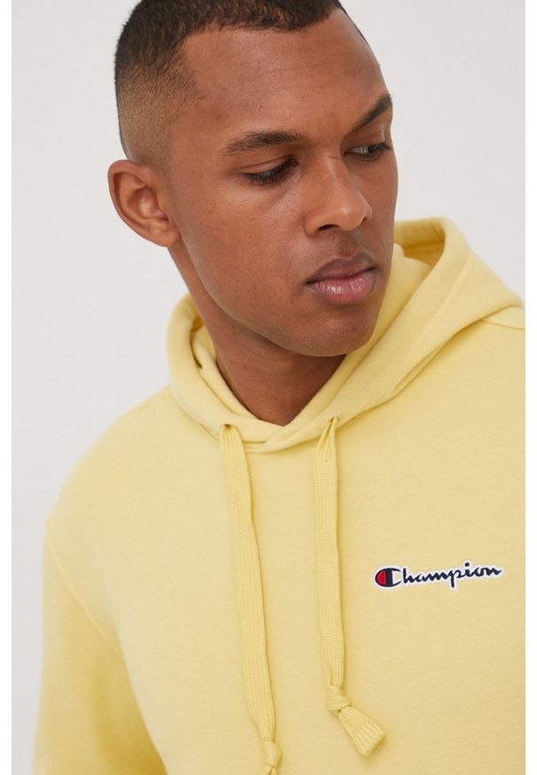 Champion bluza męska kolor żółty z kapturem melanżowa. Okazja: na co dzień. Typ kołnierza: kaptur. Kolor: żółty. Materiał: dzianina. Wzór: melanż. Styl: casual