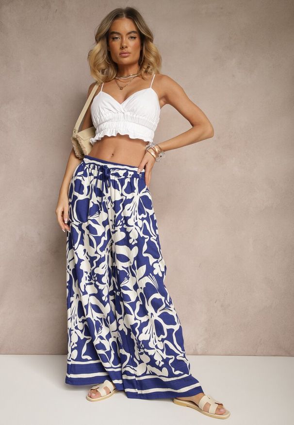 Renee - Niebieskie Spodnie o Szerokim Kroju High Waist w Kwiaty Nelrive. Okazja: na co dzień, na spacer. Stan: podwyższony. Kolor: niebieski. Wzór: kwiaty. Styl: klasyczny, casual, elegancki