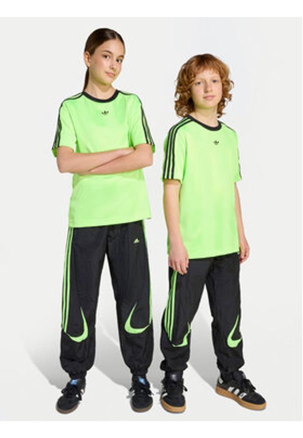 Adidas - adidas Spodnie dresowe Teamgeist JY6321 Czarny Loose Fit. Kolor: czarny. Materiał: syntetyk