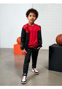 Sinsay - Sportowe spodnie z elementami odblaskowymi Active - czerwony. Kolor: czerwony. Styl: sportowy #1