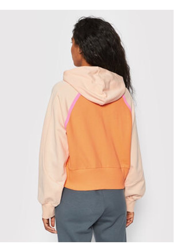 New Balance Bluza WT21501 Pomarańczowy Relaxed Fit. Kolor: pomarańczowy. Materiał: bawełna