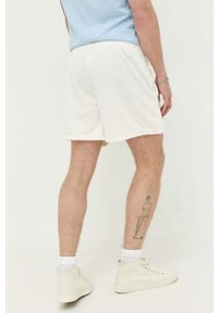 Abercrombie & Fitch szorty męskie kolor beżowy. Kolor: beżowy. Materiał: tkanina, dzianina. Wzór: aplikacja #2