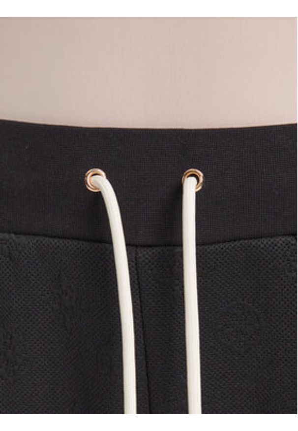 Guess Spodnie dresowe V5YB06 KBSL2 Czarny Regular Fit. Kolor: czarny. Materiał: syntetyk